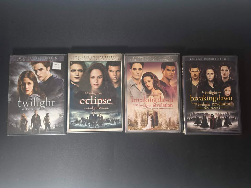 4 FILMS TWILIGHT , LA FASCINATION, HÉSITATION, RÉVÉLATION PARTIE 1 ET RÉVÉLATION PARTIE 2